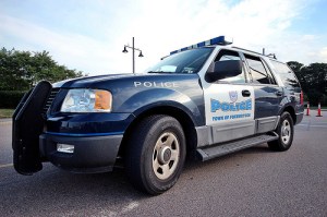 The actual police SUV that was on the scene first, but also left first before the others. 